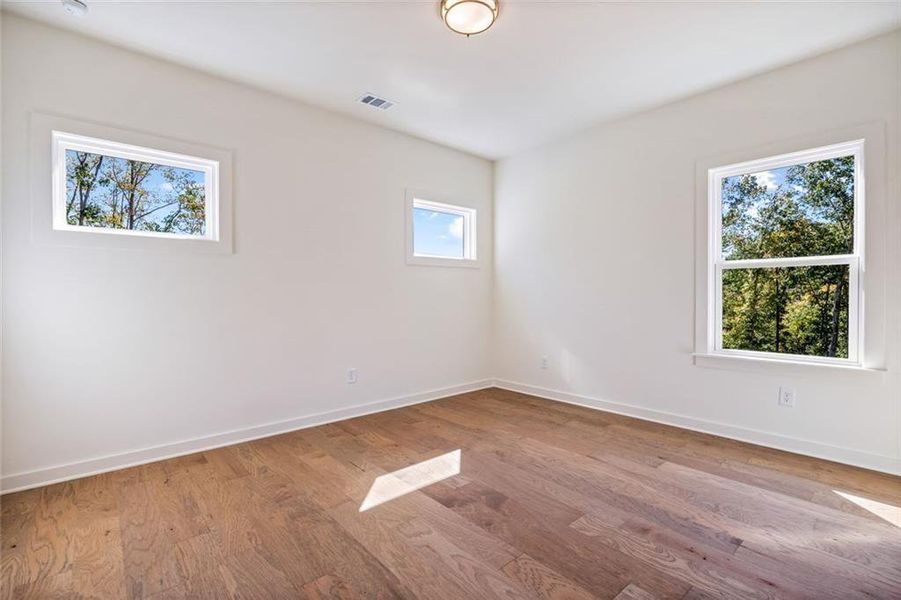 Spacious, unfurnished interior of a new home in Long Hollow Landing, Gainesville (Image 43).