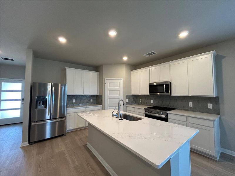 Furnished interior view inside a new home in Lakeside Meadows, Pflugerville (Image 4).