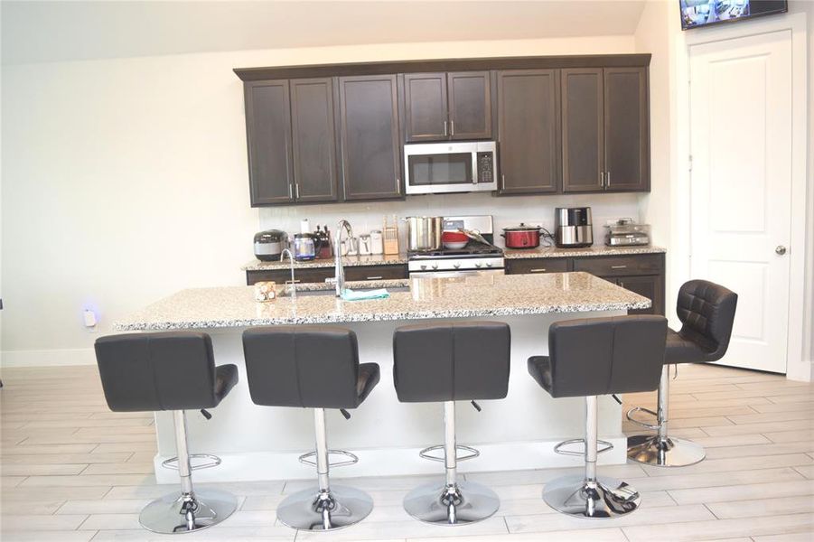 Furnished interior view inside a new home in , Hickory Creek (Image 12).