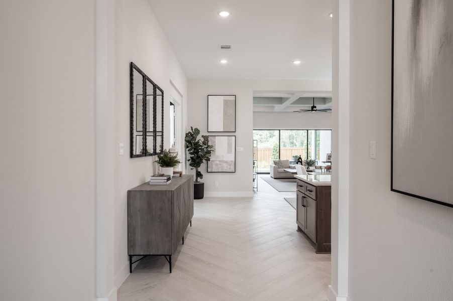 Representative furnished interior of a home built from the Carignan by Tri Pointe Homes in Sienna 80′, Missouri City (Image 5).