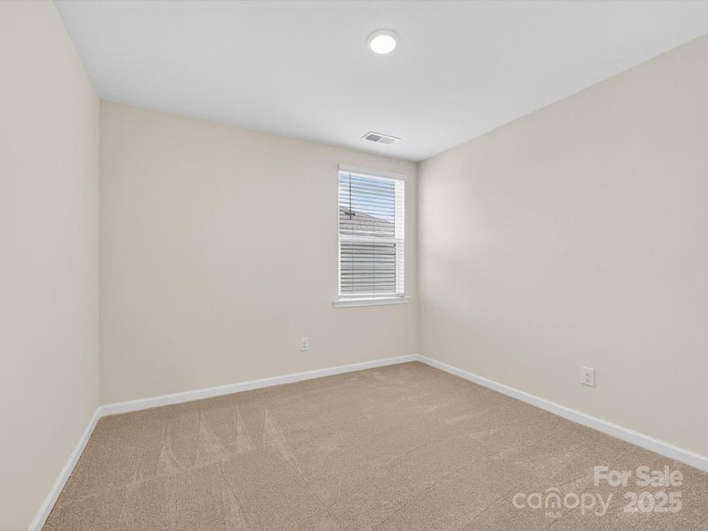 Spacious, unfurnished interior of a new home in North Creek Village, Huntersville (Image 23).
