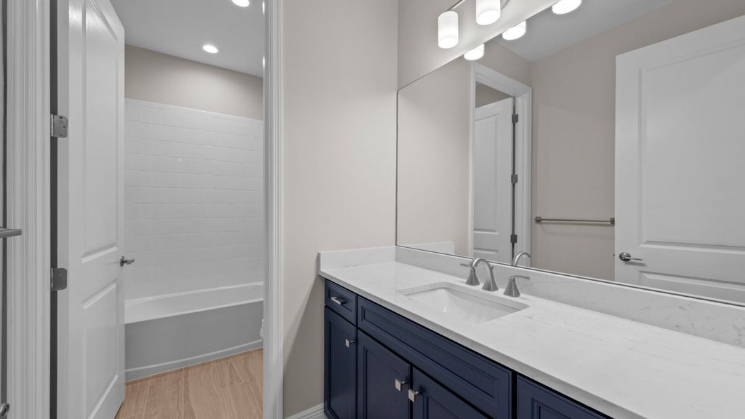 Furnished interior view inside a new home in SkySail, Naples (Image 9).