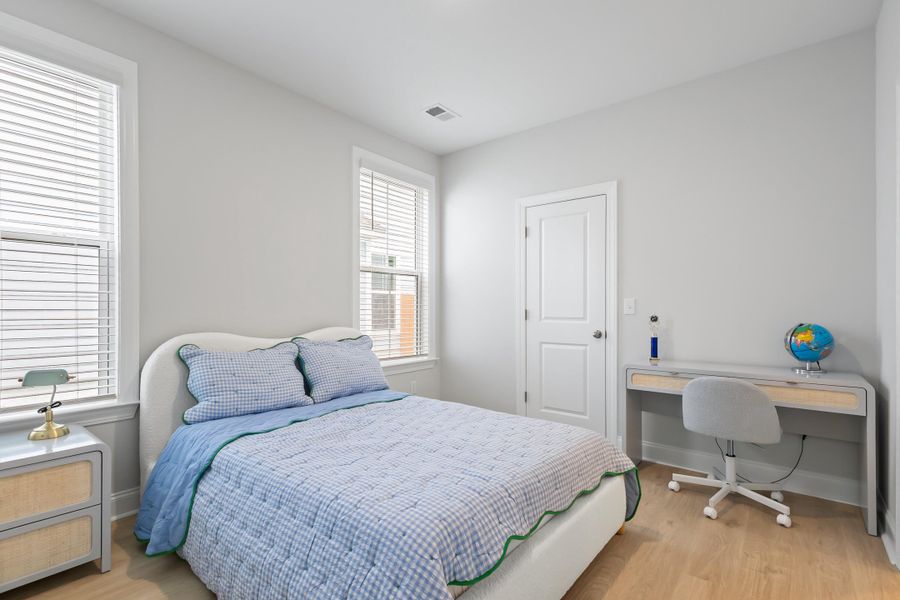 Furnished interior view inside a new home in Tidewater at Lakes of Cane Bay, Summerville (Image 30).