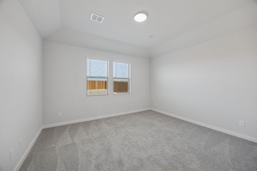 Primary Suite in the Oak II home plan by Trophy Signature Homes – REPRESENTATIVE PHOTO