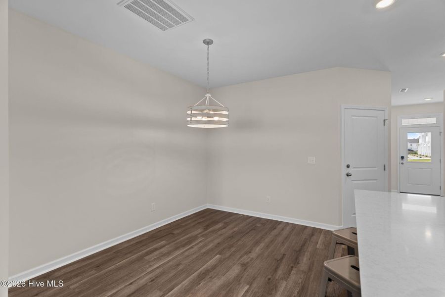Spacious, unfurnished interior of a new home in Coastal Haven Townes, Leland (Image 18).