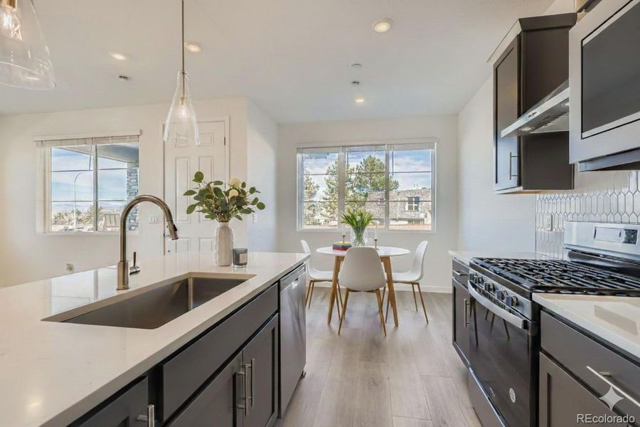 virtually staged kitchen / dining