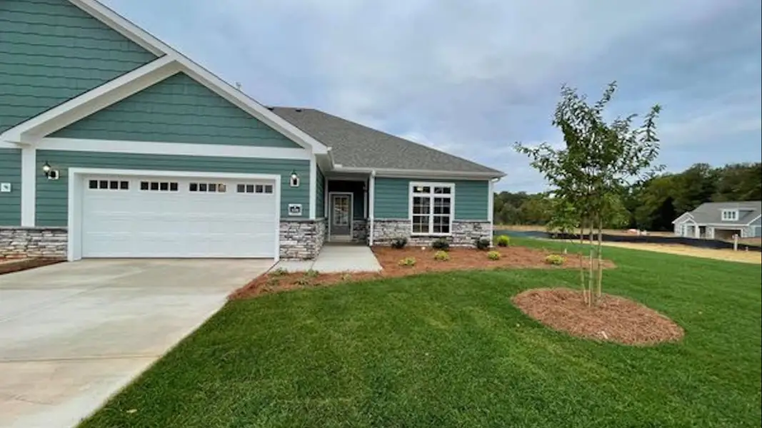 Representative exterior photo of a completed home built from the Wellington by Epcon Communities in The Villas at Pinewood, Asheboro, NC (Image 2). Representative exterior photo of a completed home built from the Wellington by Epcon Communities in The Villas at Pinewood, Asheboro, NC (Image 2).