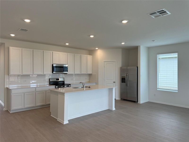 Furnished interior view inside a new home in Bertram Oaks: Classic Collection, Bertram (Image 9). Furnished interior view inside a new home in Bertram Oaks: Classic Collection, Bertram (Image 9).
