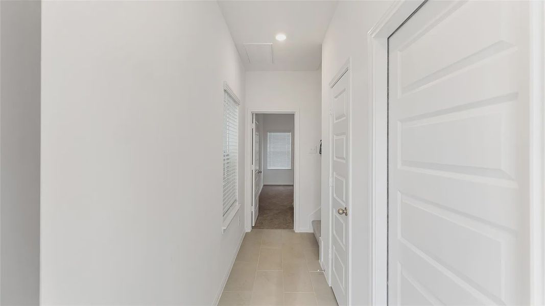Representative unfurnished interior of a home built from the Rev 2232NC by Saratoga Homes in Aldine Pines, Houston (Image 10). Representative unfurnished interior of a home built from the Rev 2232NC by Saratoga Homes in Aldine Pines, Houston (Image 10).