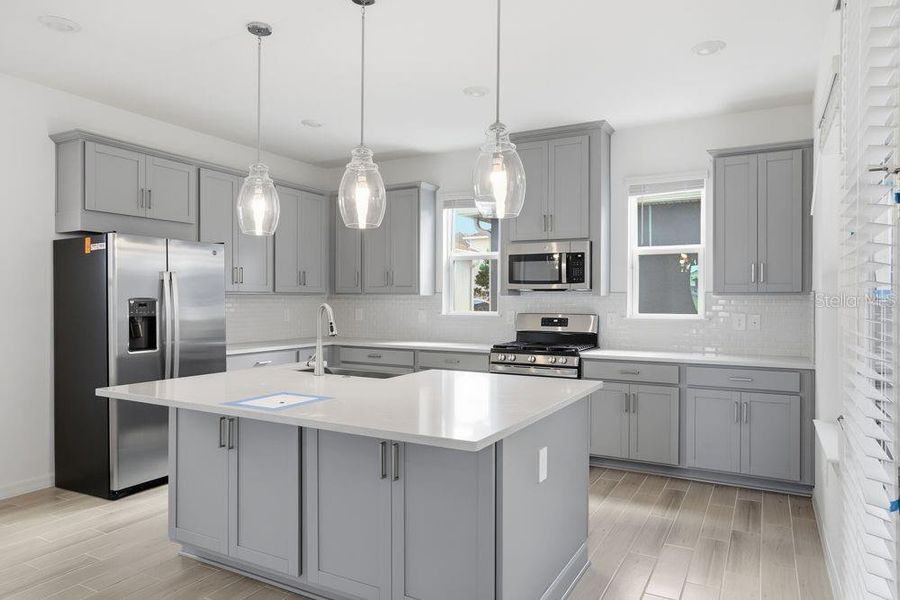 Furnished interior view inside a new home in Harvest at Ovation, Winter Garden (Image 9).