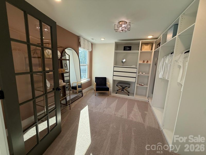 Primary sitting room; built-ins included