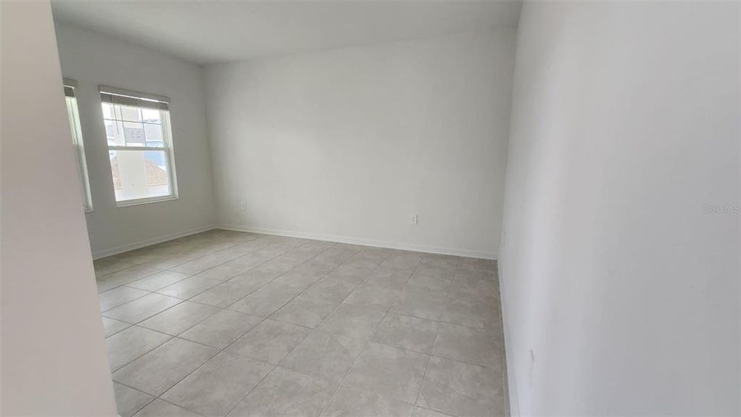 Spacious, unfurnished interior of a new home in Knightsbridge, Kissimmee (Image 7).