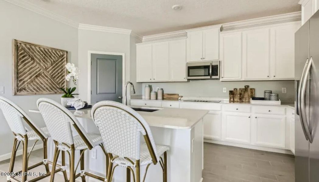 Furnished interior view inside a new home in Edenbrooke at Hyland Trail | 55+: Edenbrooke at Hyland Trail 50s, Green Cove Springs (Image 2). Furnished interior view inside a new home in Edenbrooke at Hyland Trail | 55+: Edenbrooke at Hyland Trail 50s, Green Cove Springs (Image 2).