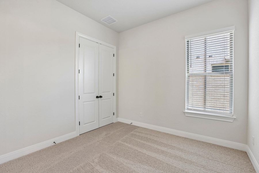 Spacious, unfurnished interior of a new home in 6 Creeks, Kyle (Image 32).