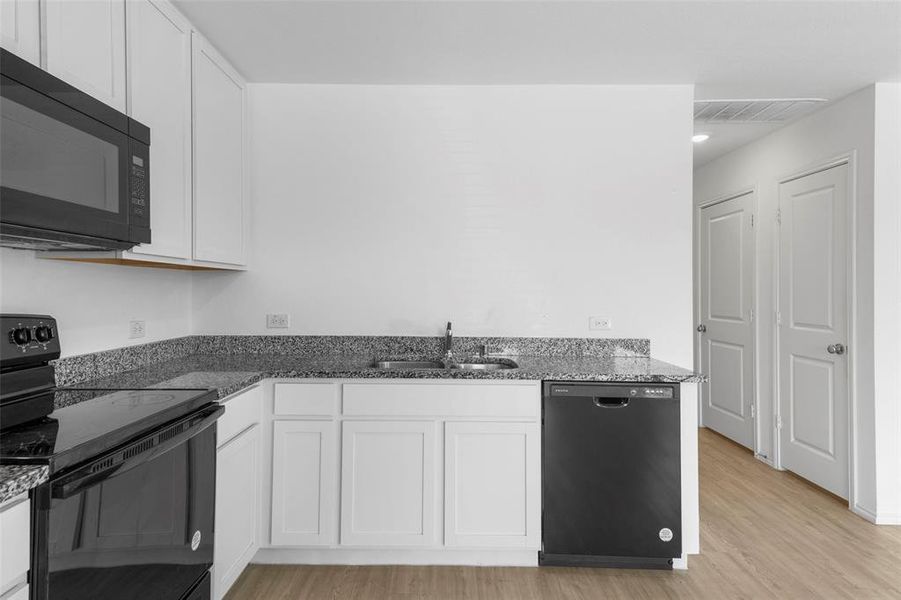 Furnished interior view inside a new home in Tillage Farms, Princeton (Image 6).