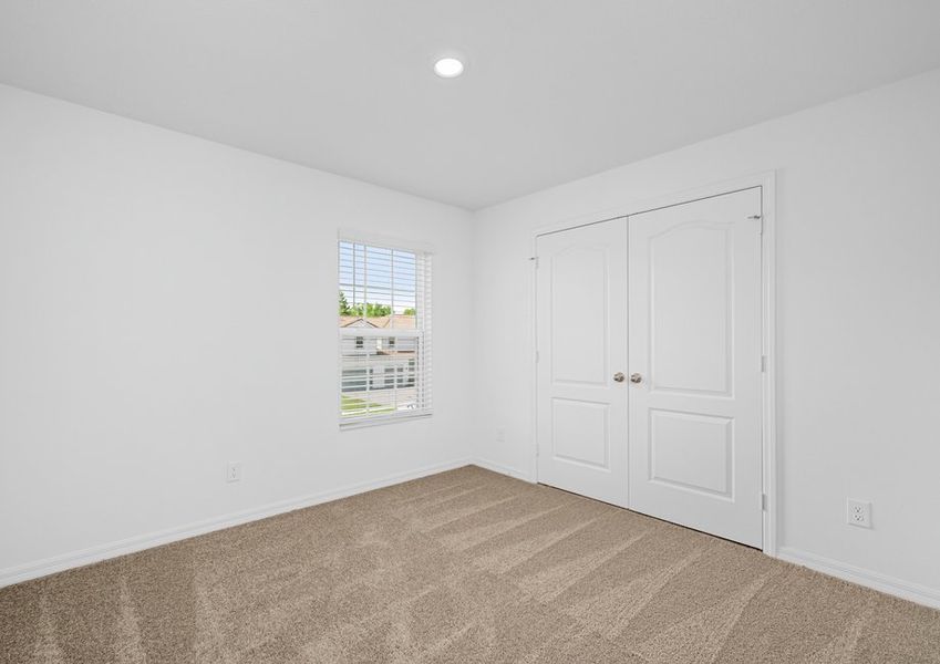 The guest bedrooms are spacious and have plenty of natural light The guest bedrooms are spacious and have plenty of natural light