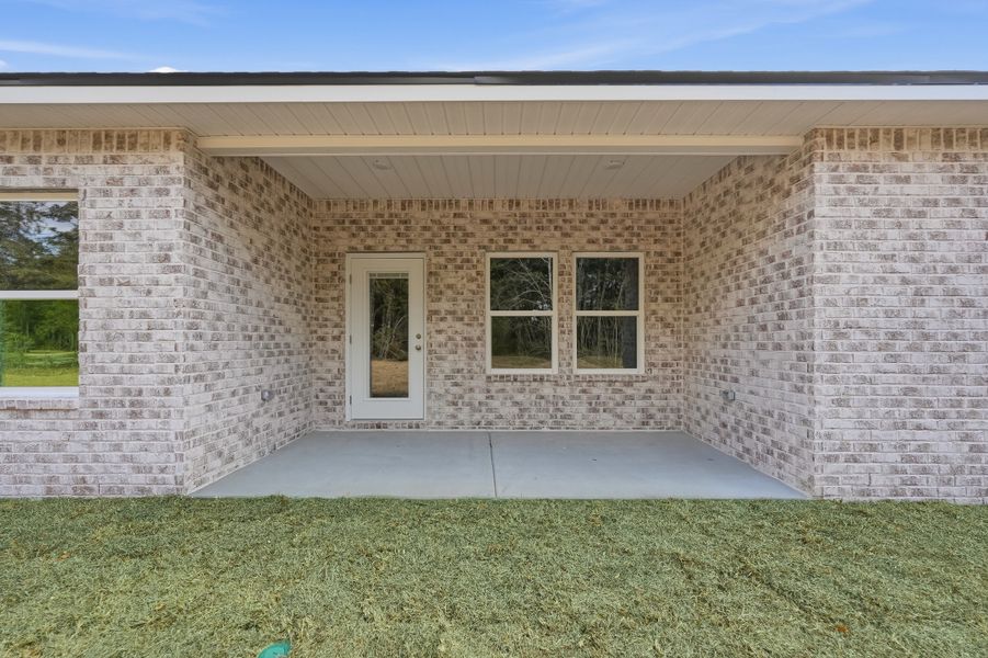 Exterior details and patio area of a home in Southern Charm, Crestview (Image 24).
