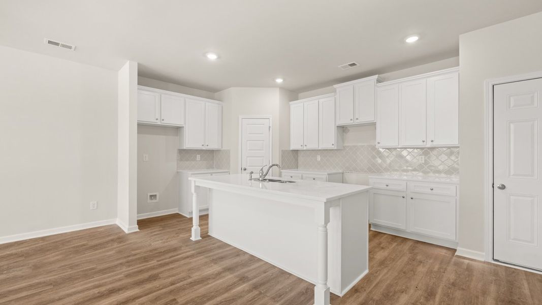 Representative furnished interior of a home built from the AnsonTH by D.R. Horton in Brookland Commons, Monroe (Image 4).