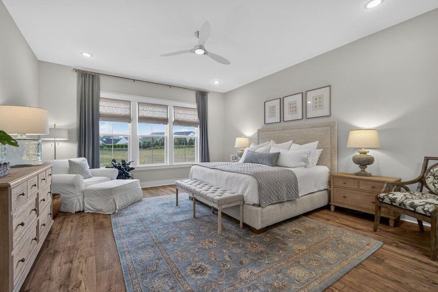 Furnished interior view inside a new home in K. Hovnanian's® Four Seasons at Lakes of Cane Bay, Summerville (Image 6).