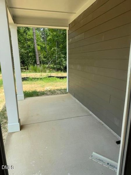 Exterior details and patio area of a home in The Walk at East Village, Clayton (Image 4).