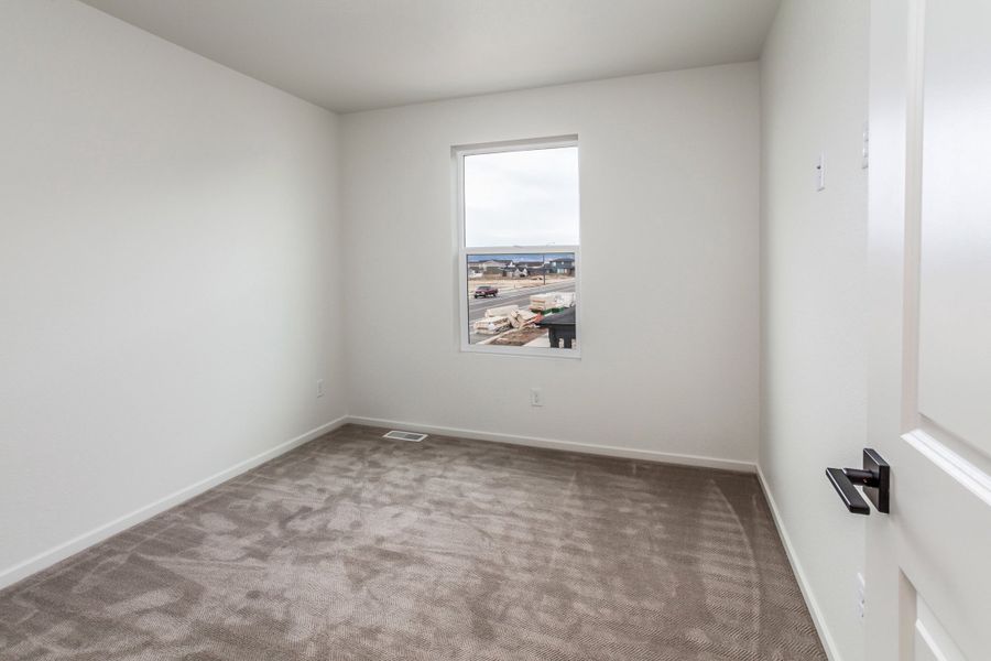 Representative unfurnished interior of a home built from the Sage by Hartford Homes in Bloom, Fort Collins (Image 30).