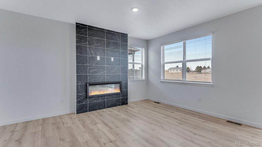 Spacious, unfurnished interior of a new home in Trails at Crowfoot, Parker (Image 24).