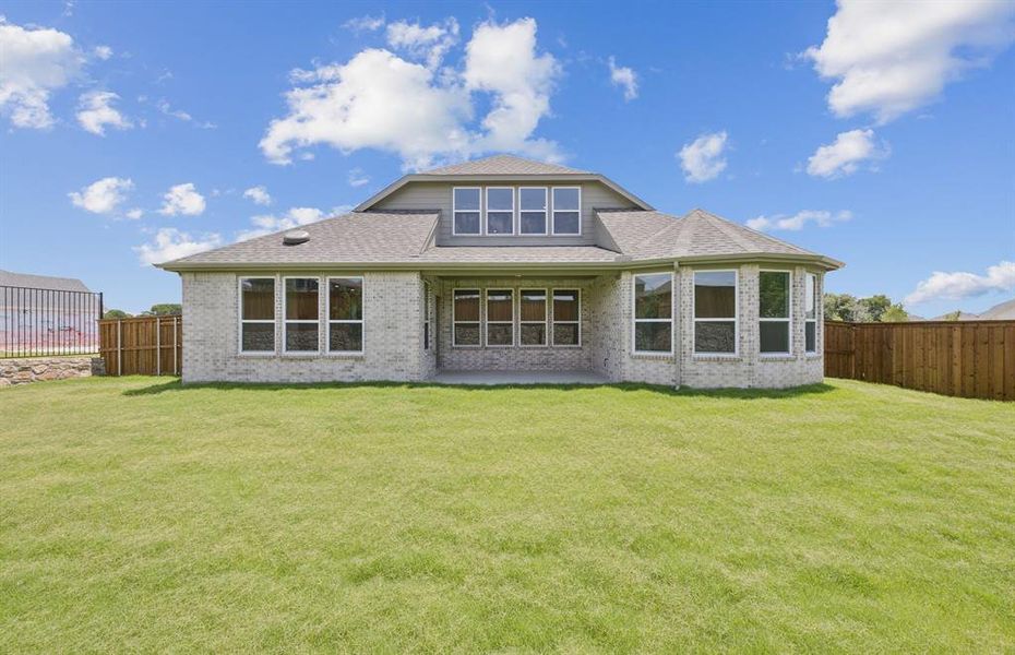 Oversized yard with covered patio *Real home pictured Oversized yard with covered patio *Real home pictured