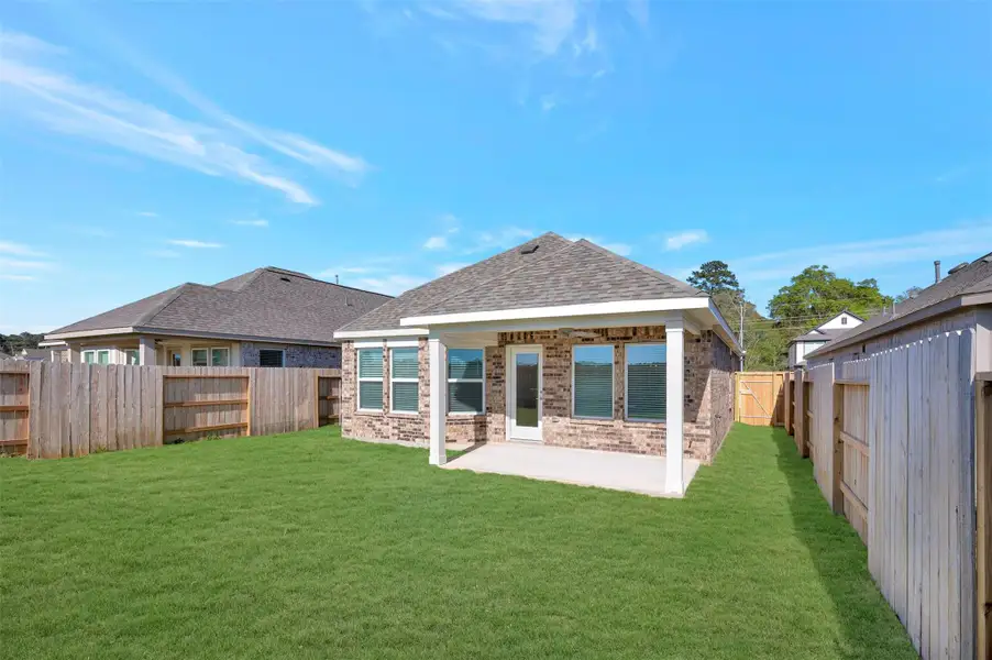 Exterior details and patio area of a home in Sorella, Tomball (Image 4).