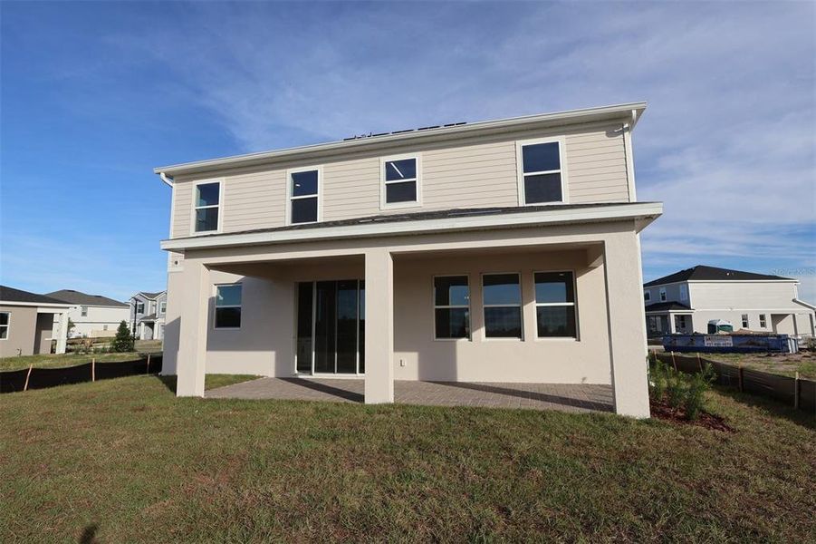 Exterior details and patio area of a home in Bay Lake Farms, St. Cloud (Image 16).
