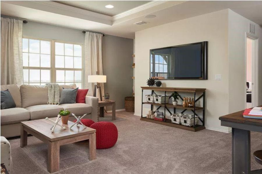 Photo of Pulte model home with same floor plan, not of actual home listed.