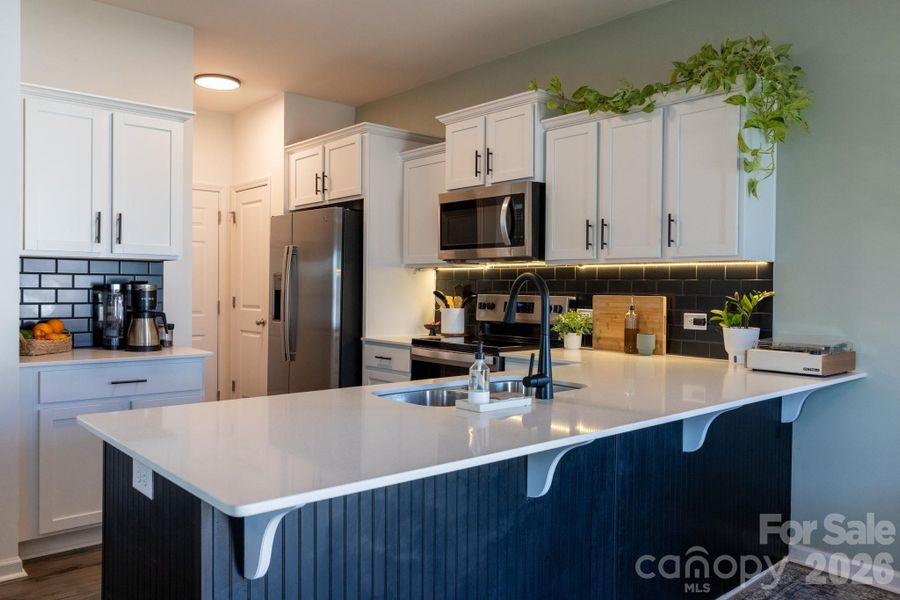 Kitchen with barstool seating Kitchen with barstool seating