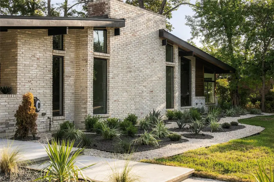 Exterior details and patio area of a home in , Houston (Image 3).