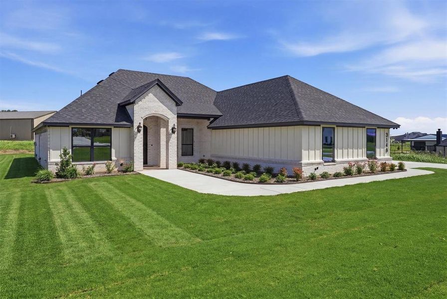 Front exterior of a new home in , Weatherford, TX, highlighting curb appeal (Image 1). Front exterior of a new home in , Weatherford, TX, highlighting curb appeal (Image 1).