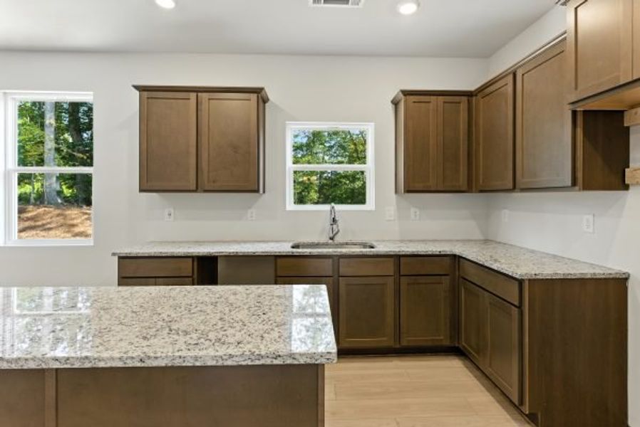 Representative furnished interior of a home built from the Brentwood by Piedmont Residential in Falls Creek, Flowery Branch (Image 6).
