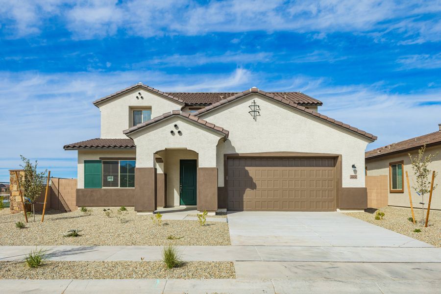Front exterior of a new home in Frontera, Surprise, AZ, highlighting curb appeal (Image 2). Front exterior of a new home in Frontera, Surprise, AZ, highlighting curb appeal (Image 2).
