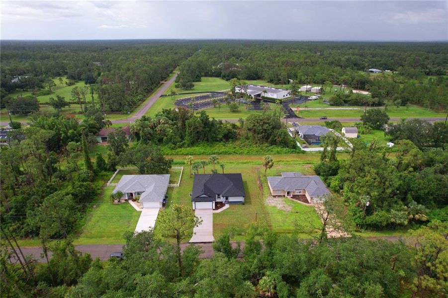 Front exterior of a new home in , North Port, FL, highlighting curb appeal (Image 25).