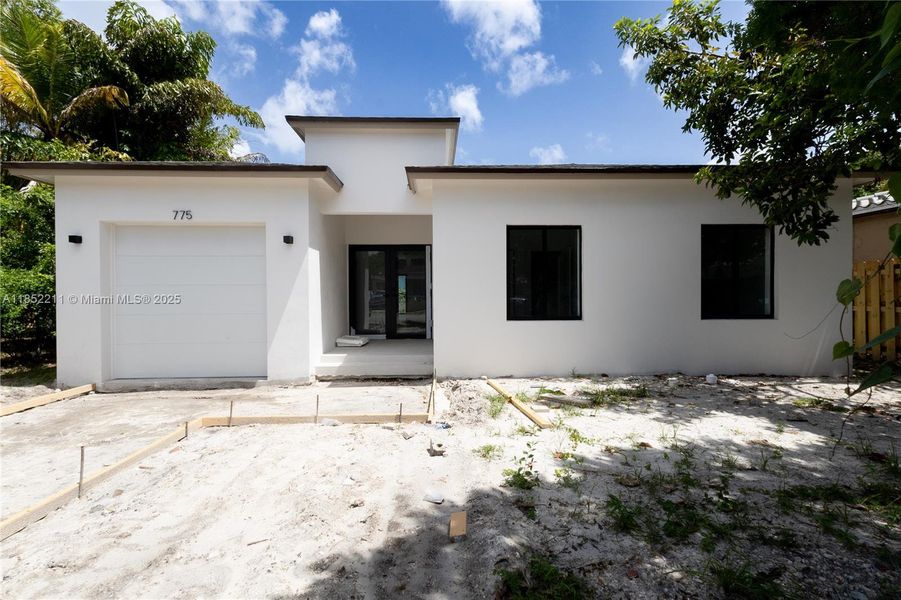 Front exterior of a new home in , Miami, FL, highlighting curb appeal (Image 2). Front exterior of a new home in , Miami, FL, highlighting curb appeal (Image 2).