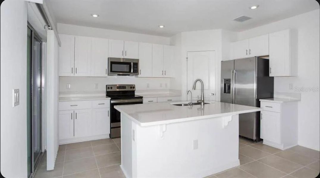Furnished interior view inside a new home in Firethorn, Parrish (Image 4).