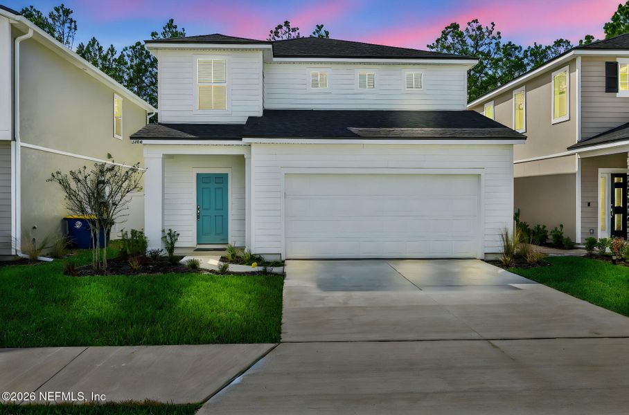 Front exterior of a new home in Cedar Creek, Jacksonville, FL, highlighting curb appeal (Image 24).