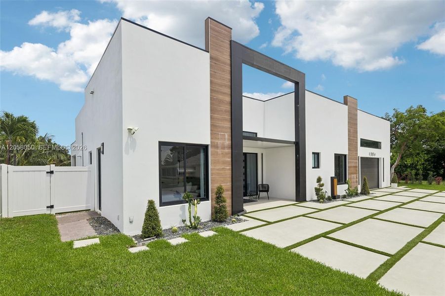 Front exterior of a new home in , Deerfield Beach, FL, highlighting curb appeal (Image 22). Front exterior of a new home in , Deerfield Beach, FL, highlighting curb appeal (Image 22).