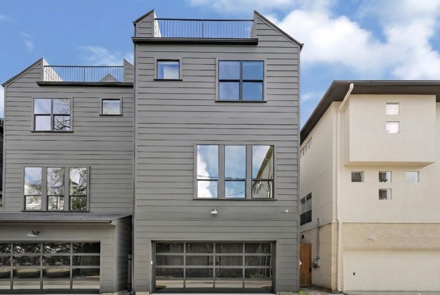 Front exterior of a new home in , Houston, TX, highlighting curb appeal (Image 26).