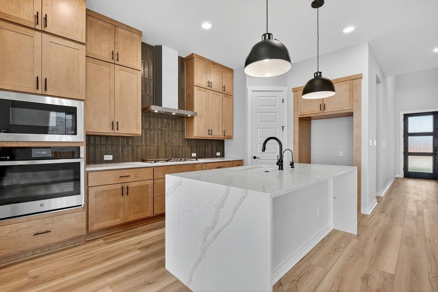 Furnished interior view inside a new home in Arbor Collection at Lariat, Liberty Hill (Image 8). Furnished interior view inside a new home in Arbor Collection at Lariat, Liberty Hill (Image 8).