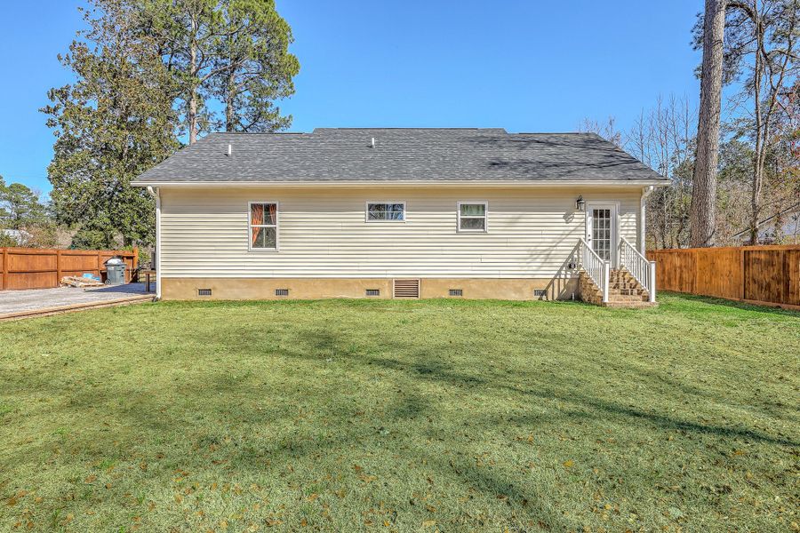 Exterior details and patio area of a home in , Holly Hill (Image 29). Exterior details and patio area of a home in , Holly Hill (Image 29).
