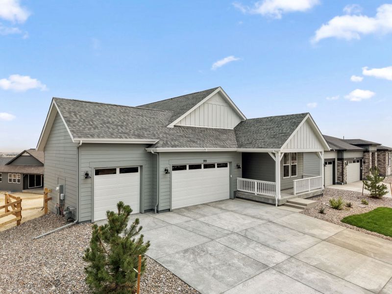 Front exterior of a new home in Independence, Elizabeth, CO, highlighting curb appeal (Image 17).