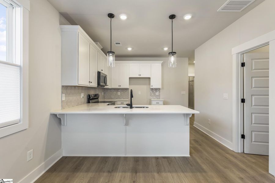 Furnished interior view inside a new home in Renaissance Place, Greenville (Image 3).