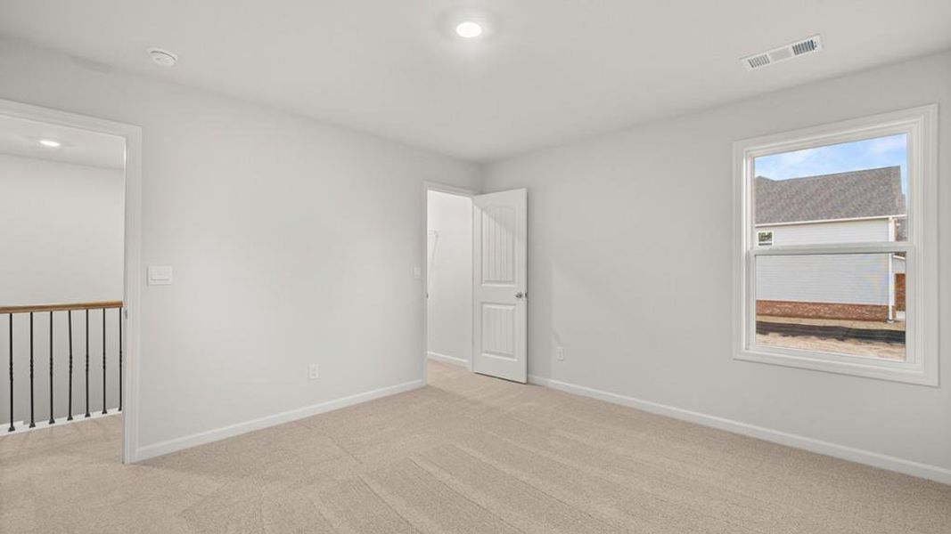 Spacious, unfurnished interior of a new home in Butner Estates, South Fulton (Image 23).