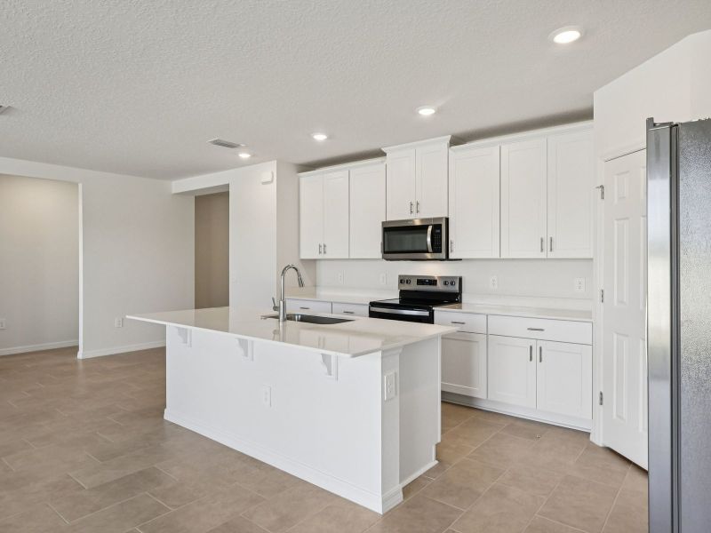 Furnished interior view inside a new home in The Meadow at Crossprairie, St. Cloud (Image 3).