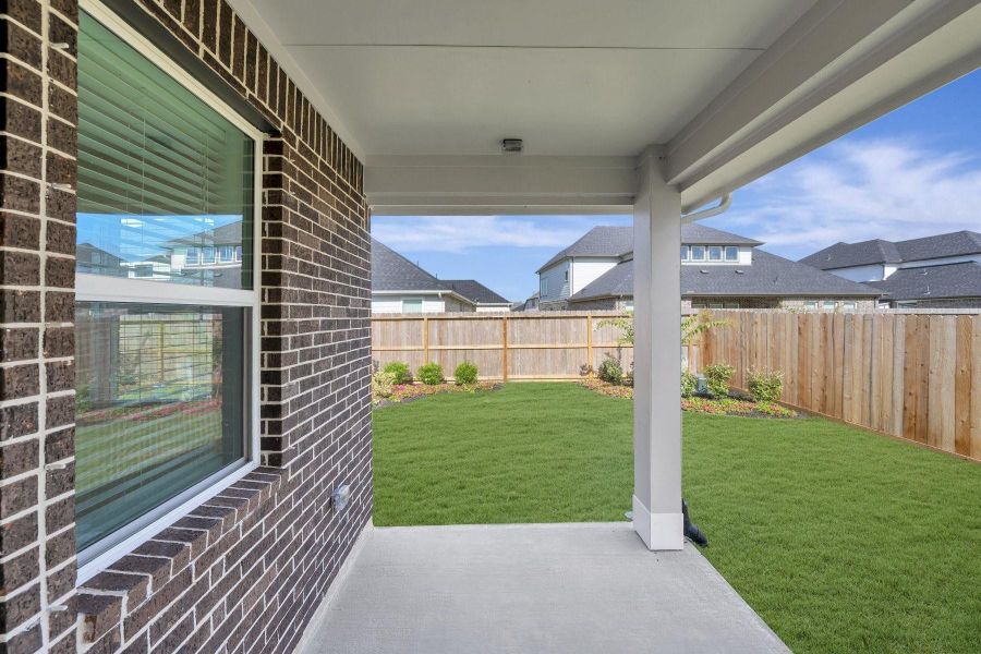 Relax outdoors on the covered patio Relax outdoors on the covered patio