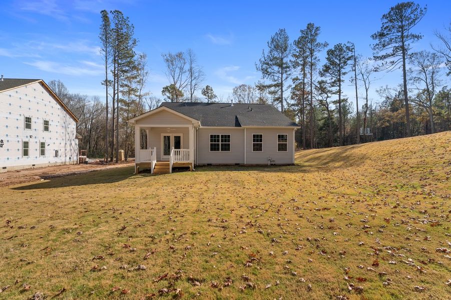 Exterior details and patio area of a home in Landing at Pine Lake, Anderson (Image 3).