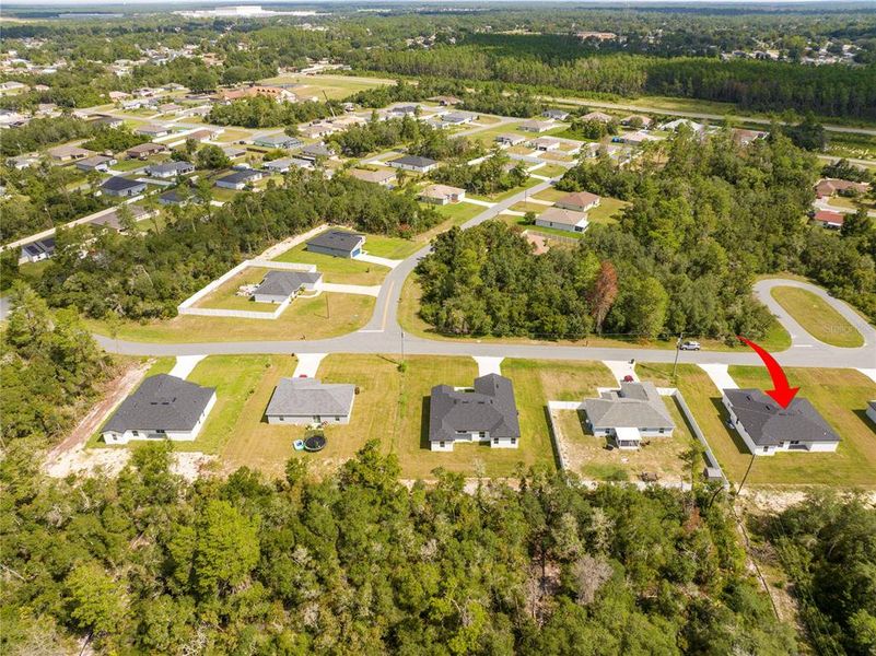 Front exterior of a new home in , Ocala, FL, highlighting curb appeal (Image 32).